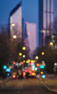 Defocused image of illuminated city street