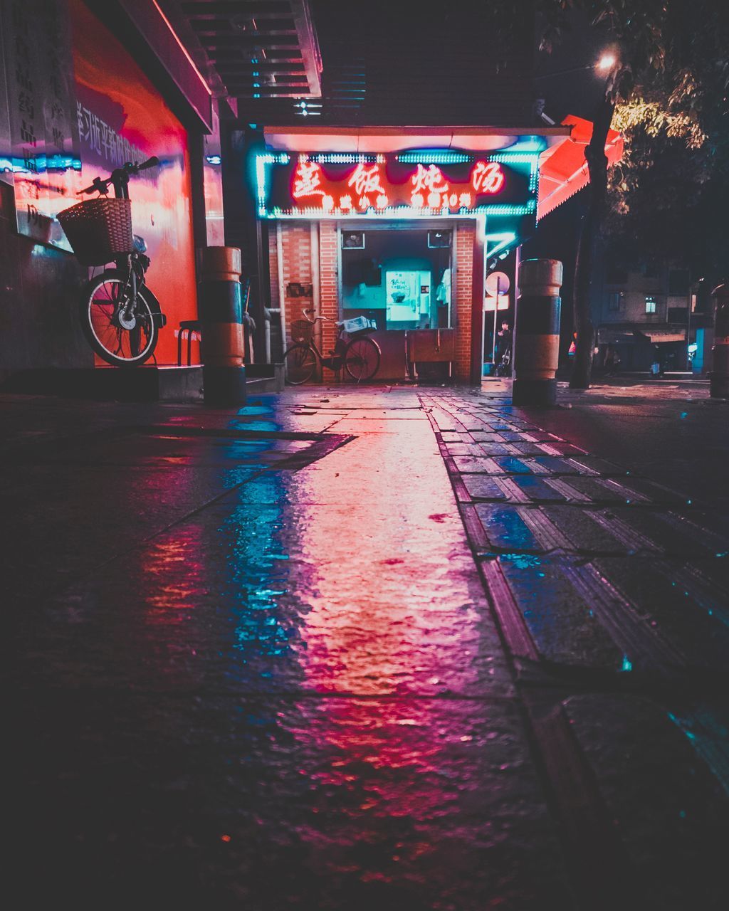 ILLUMINATED STREET DURING RAINY SEASON