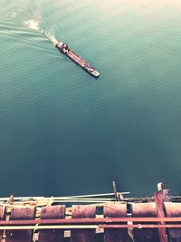 High angle view of ship sailing in sea