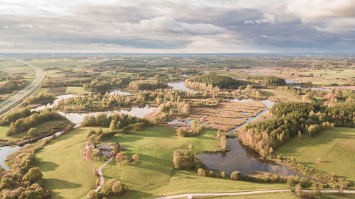 High angle view of trees on field against sky