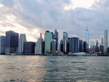 Modern buildings in city against sky