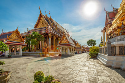 Temple outside building against sky