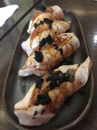 High angle view of meat in plate on table