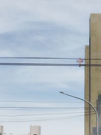 Low angle view of electricity pylon