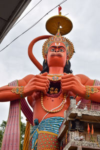 Big statue of lord hanuman near the delhi metro bridge situated near karol bagh, delhi, india