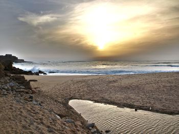 Scenic view of sea at sunset