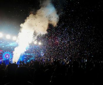 People enjoying at music concert