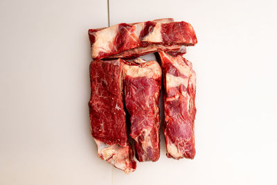 Close-up of bread against white background