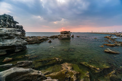 Scenic view of sea against sky during sunset