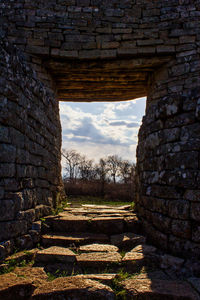 Old stone wall against sky