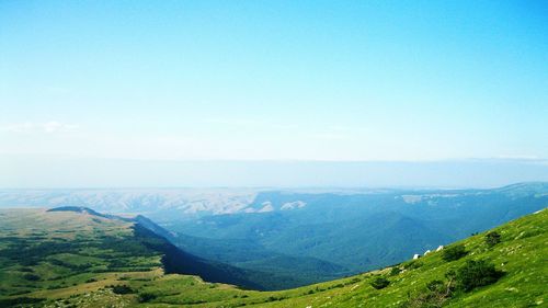 Scenic view of mountains against clear sky