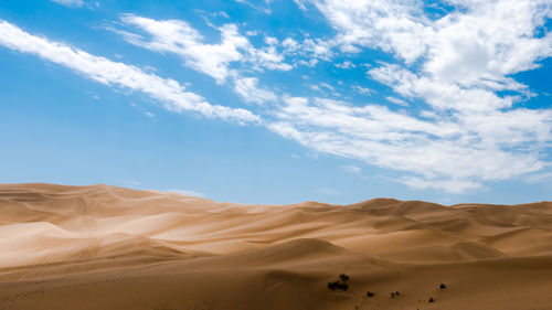 Scenic view of desert against sky