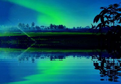 Scenic view of lake against blue sky