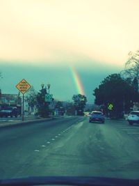 Rainbow over road