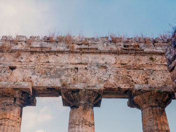 Low angle view of built structure against blue sky