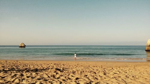 Scenic view of sea against clear sky