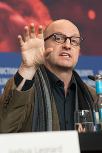 Portrait of mid adult man in eyeglasses