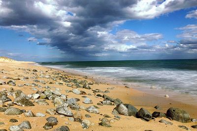 Scenic view of beach against sky