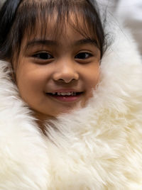 Close-up portrait of smiling boy