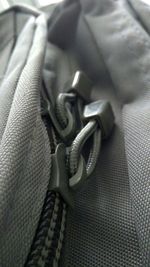 Close-up of chain tied up metal