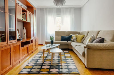 Interior of a living room decorated with corner sofa