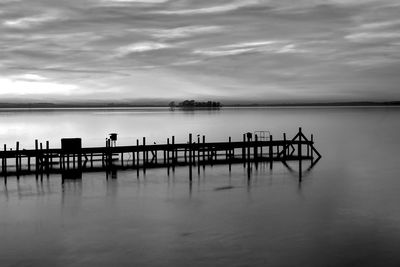 Pier on sea against sky