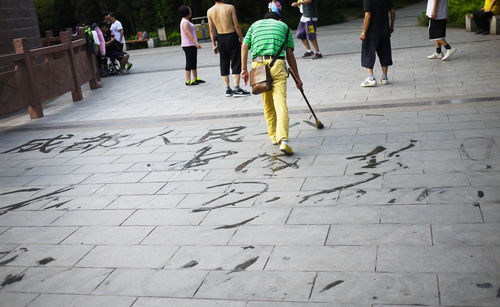 People walking on footpath