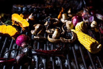 High angle view of meat on barbecue