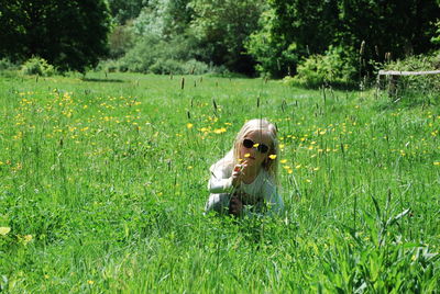 Portrait of woman on field