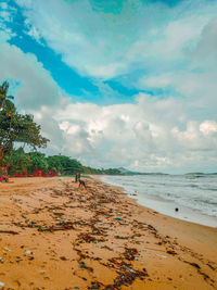 Scenic view of beach against sky