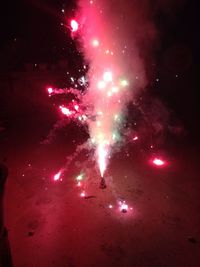 Firework display at night