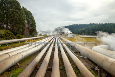 Panoramic view of factory against sky