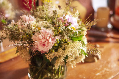 Close-up of pink flower vase on table