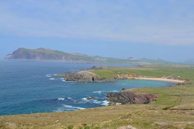 Scenic view of landscape against blue sky