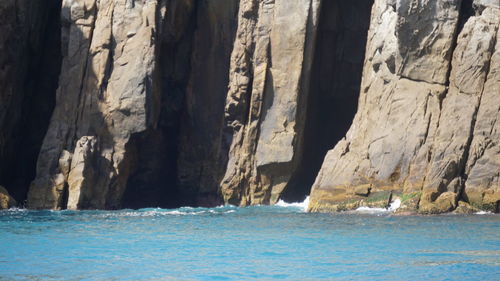 Scenic view of sea and rock formation