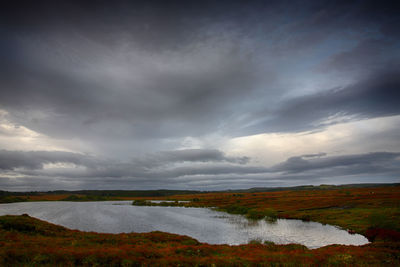 Scenic view of river against sky