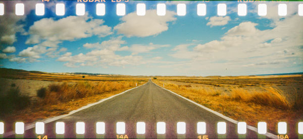 View of empty road along landscape