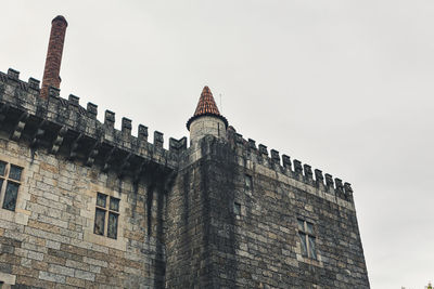 Low angle view of historical building against sky