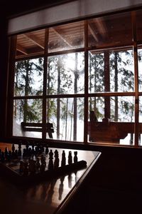 View of chess through window