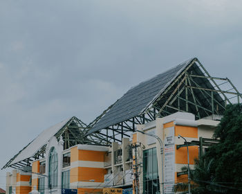 Low angle view of buildings against sky