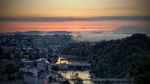 High angle view of townscape against sky during sunset