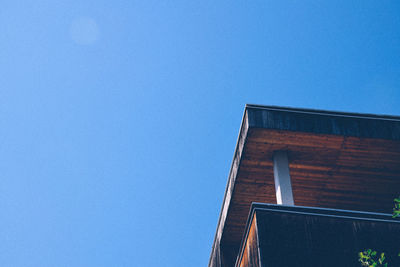 Low angle view of built structure against clear blue sky