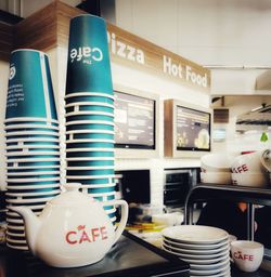 Close-up of coffee cups on table