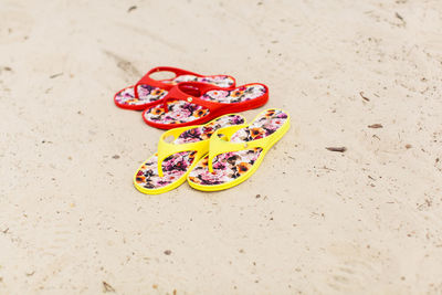 High angle view of shoes on sand