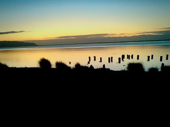 Scenic view of sunset over river