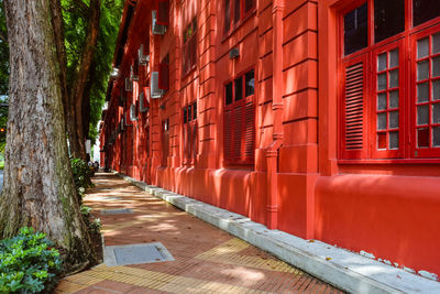 Narrow alley amidst buildings in city