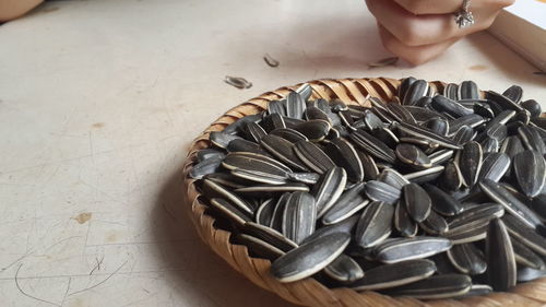 Close-up of hands on table