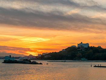 Scenic view of sea against sky during sunset