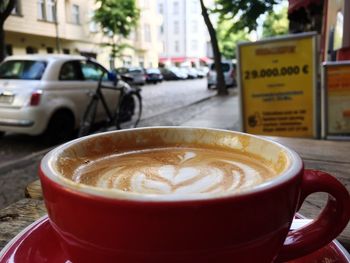 Close-up of coffee cup on table