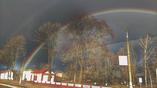 Firework display against sky